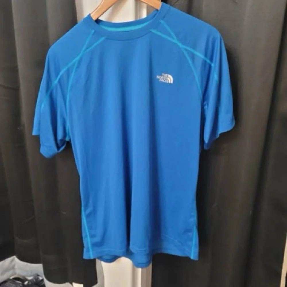 The North Face Men’s Electric Blue Short Sleeve Swim Rash Guard